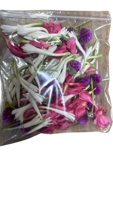 Buy fresh assorted flower pack with jasmine, roses, and amaranth – perfect for pujas, weddings, and home décor. Handpicked flowers for long-lasting freshness!






